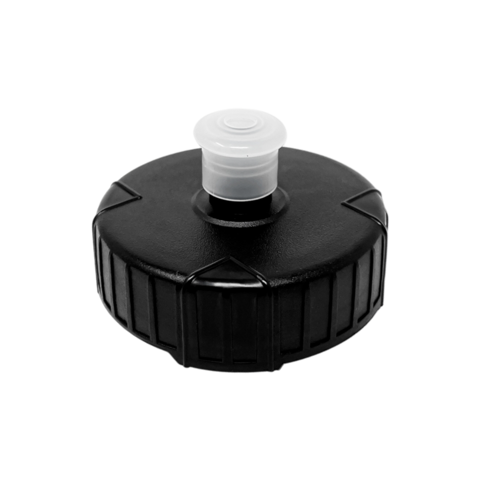 Black plastic component with a white cap on a white background